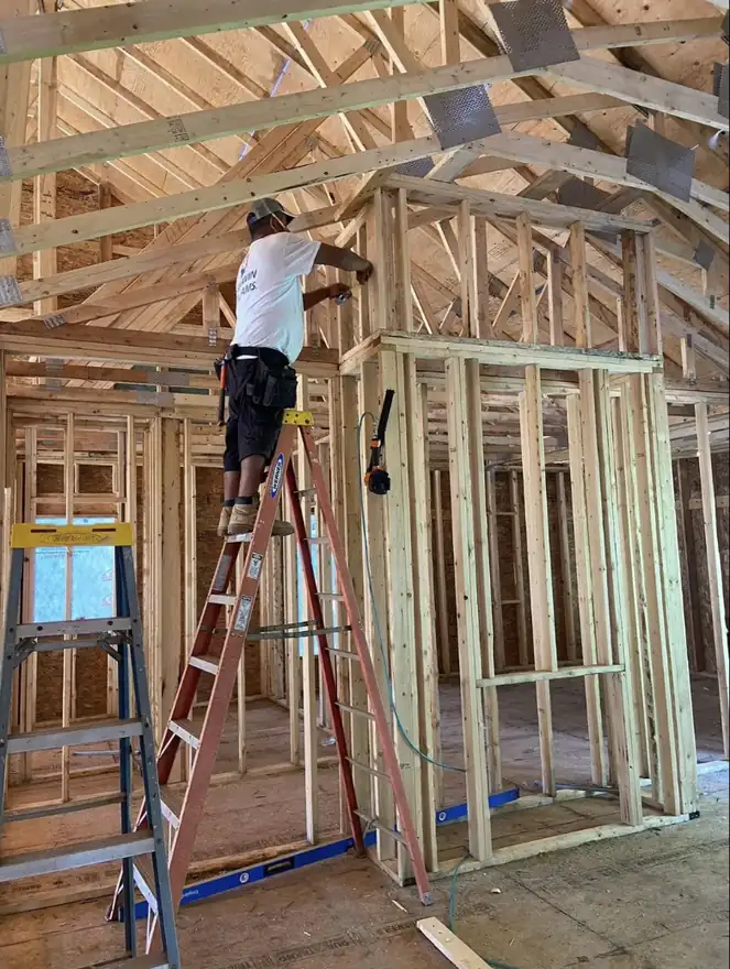 Black Rock Remodeling crew framing a room, in progress